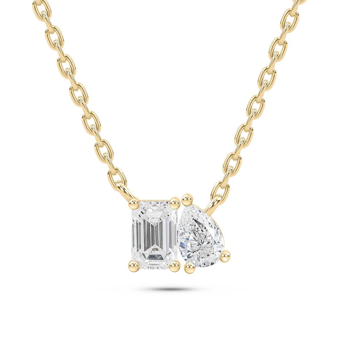 A fine chain necklace with a rectangular center and a teardrop-shaped side detail.