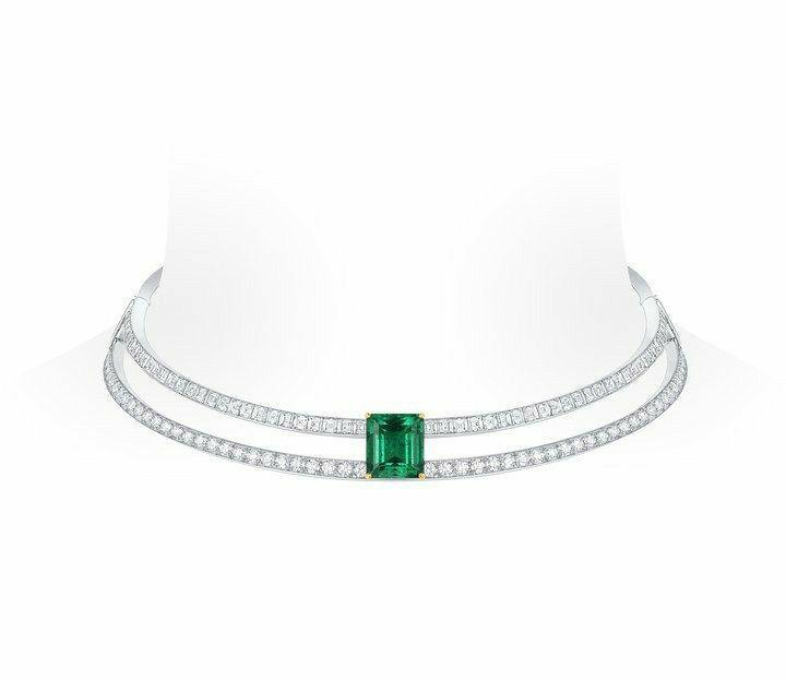 a close-fitting collar with a rectangular green-toned center