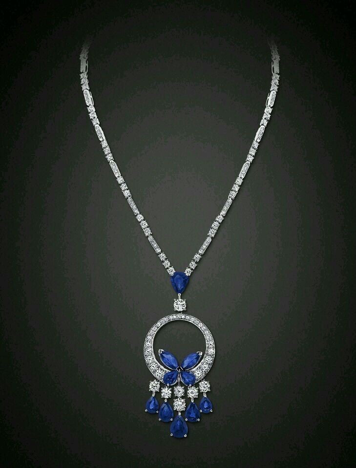 a blue-toned pendant on a fine chain