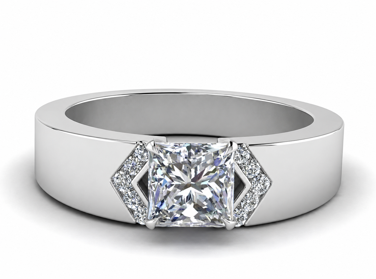 A square clear centre is flanked by angular sparkling accents on a broad polished band.