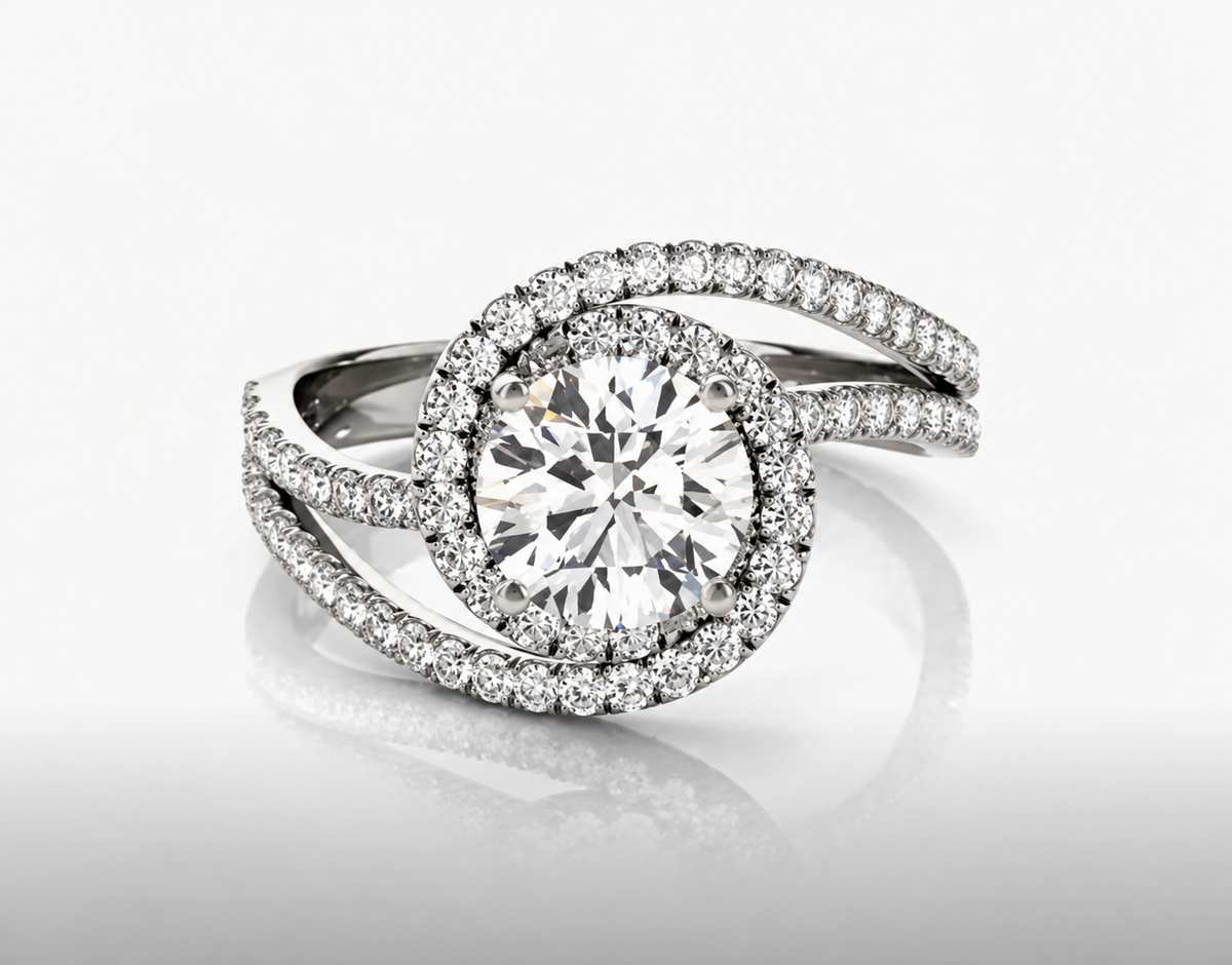 A round clear centre and halo are embraced by open, curving stone-lined bands.