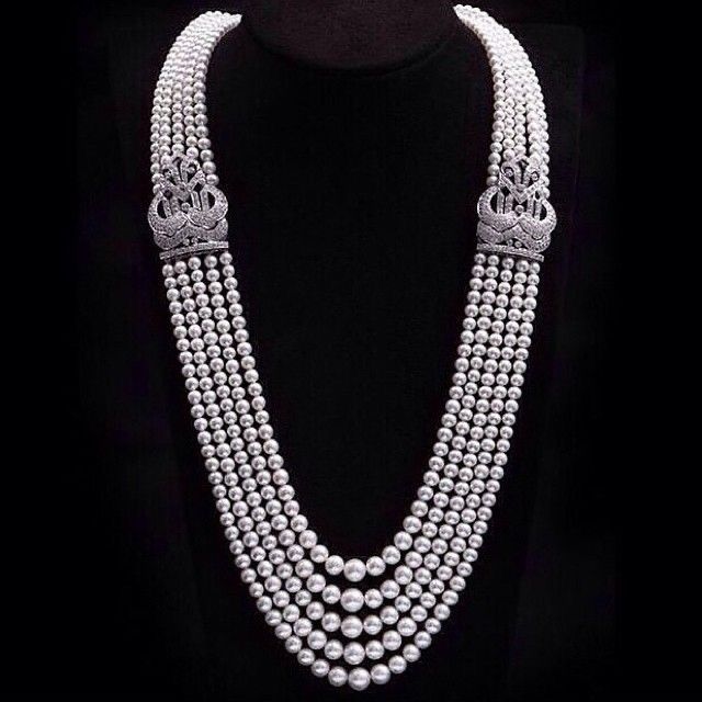 three rows of pale round accents
