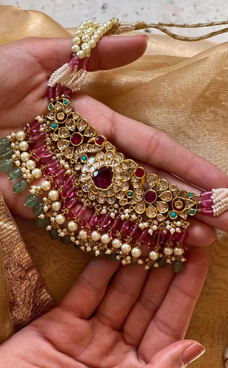 a round center detail with a hanging drop