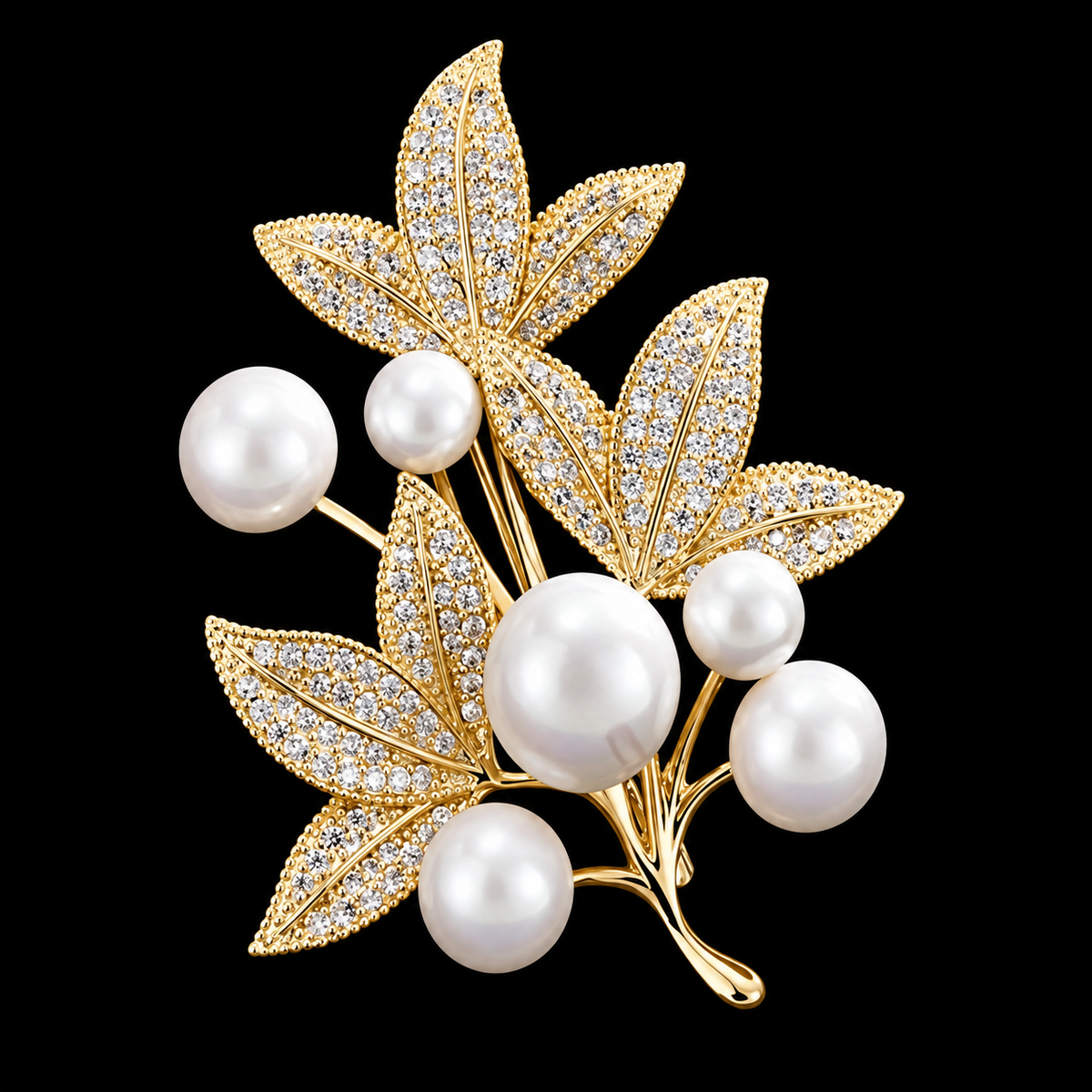 Sparkling pointed leaves and graduated pale beads form an airy gold-coloured botanical spray.