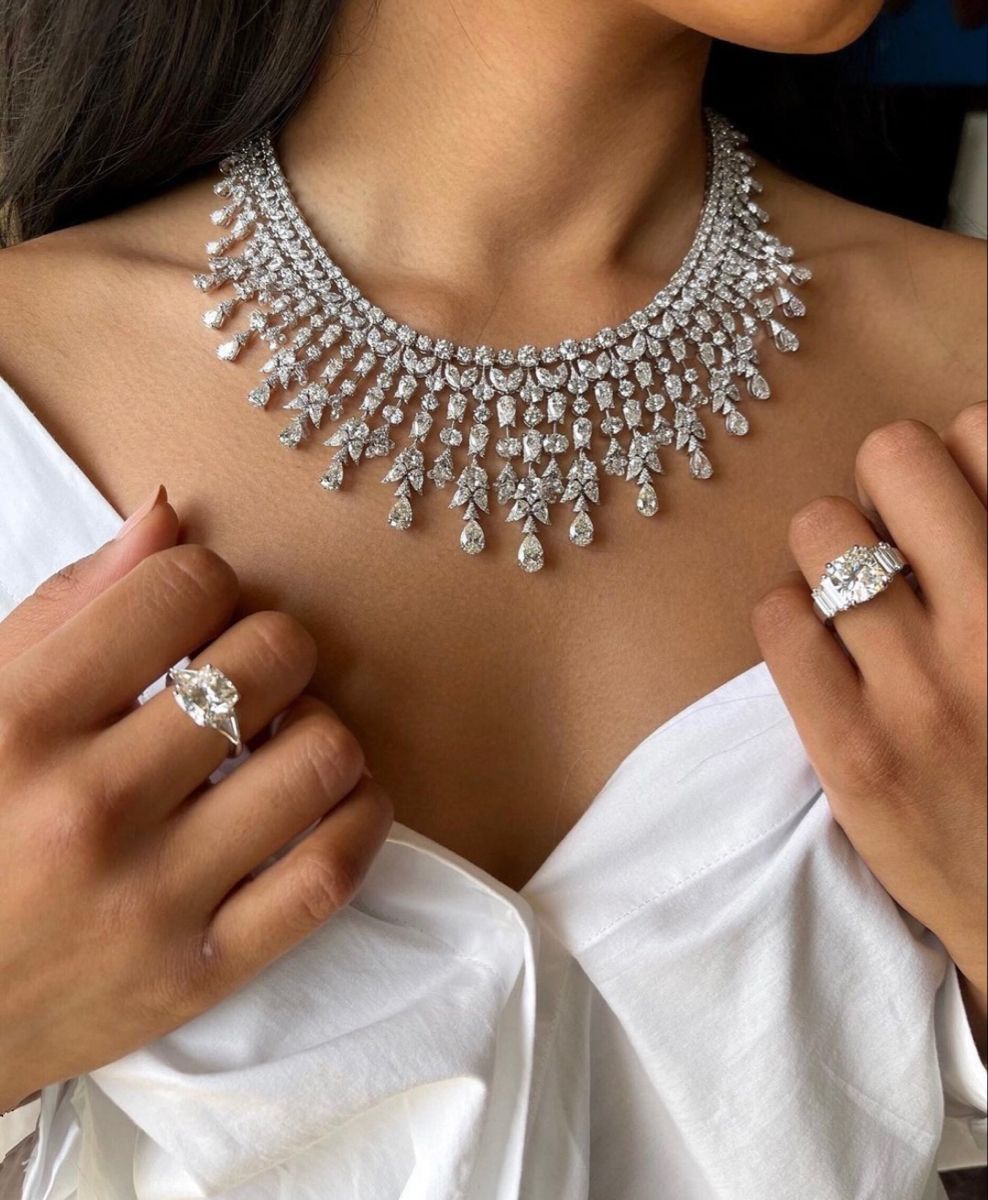 a necklace with repeating bright details arranged like a vine