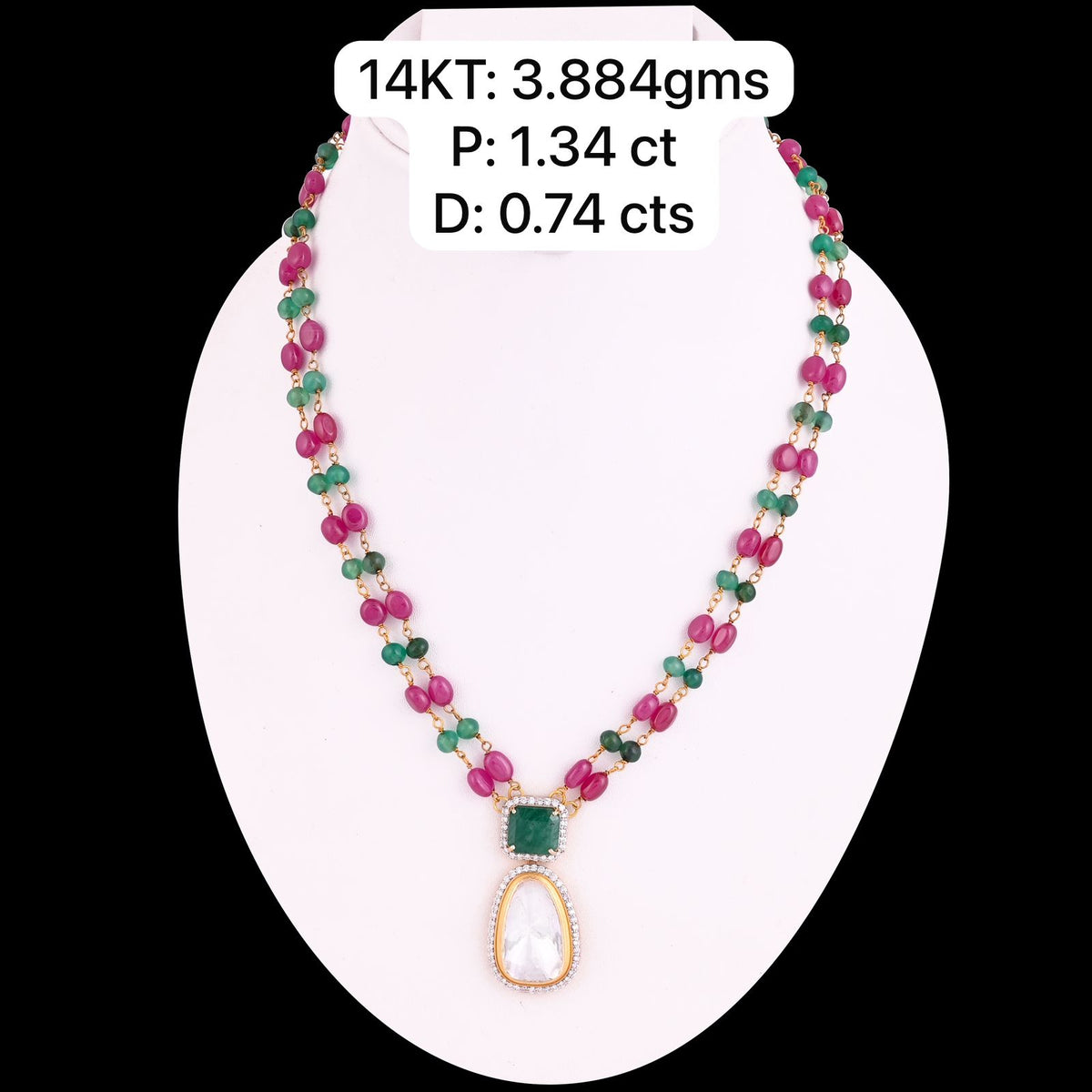 a necklace with small green-toned beads and a centered drop