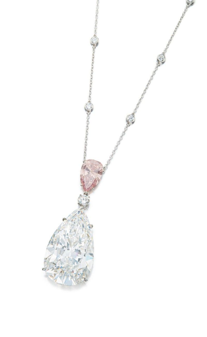 a fine chain with a centered pear-shaped drop
