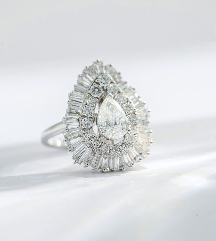 Pear diamond halo ring
