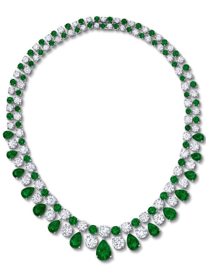 A rounded necklace design with evenly spaced green-toned drops.