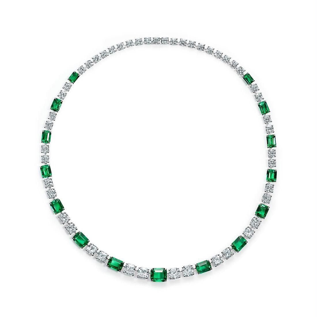 A fine necklace with spaced green-toned square accents.