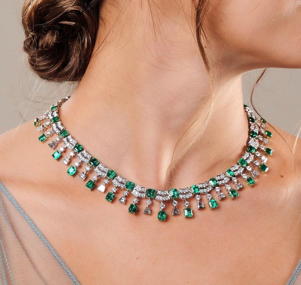 green-toned accents arranged in a repeating floral pattern