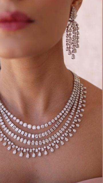 multiple rows with repeated pale round accents and hanging details