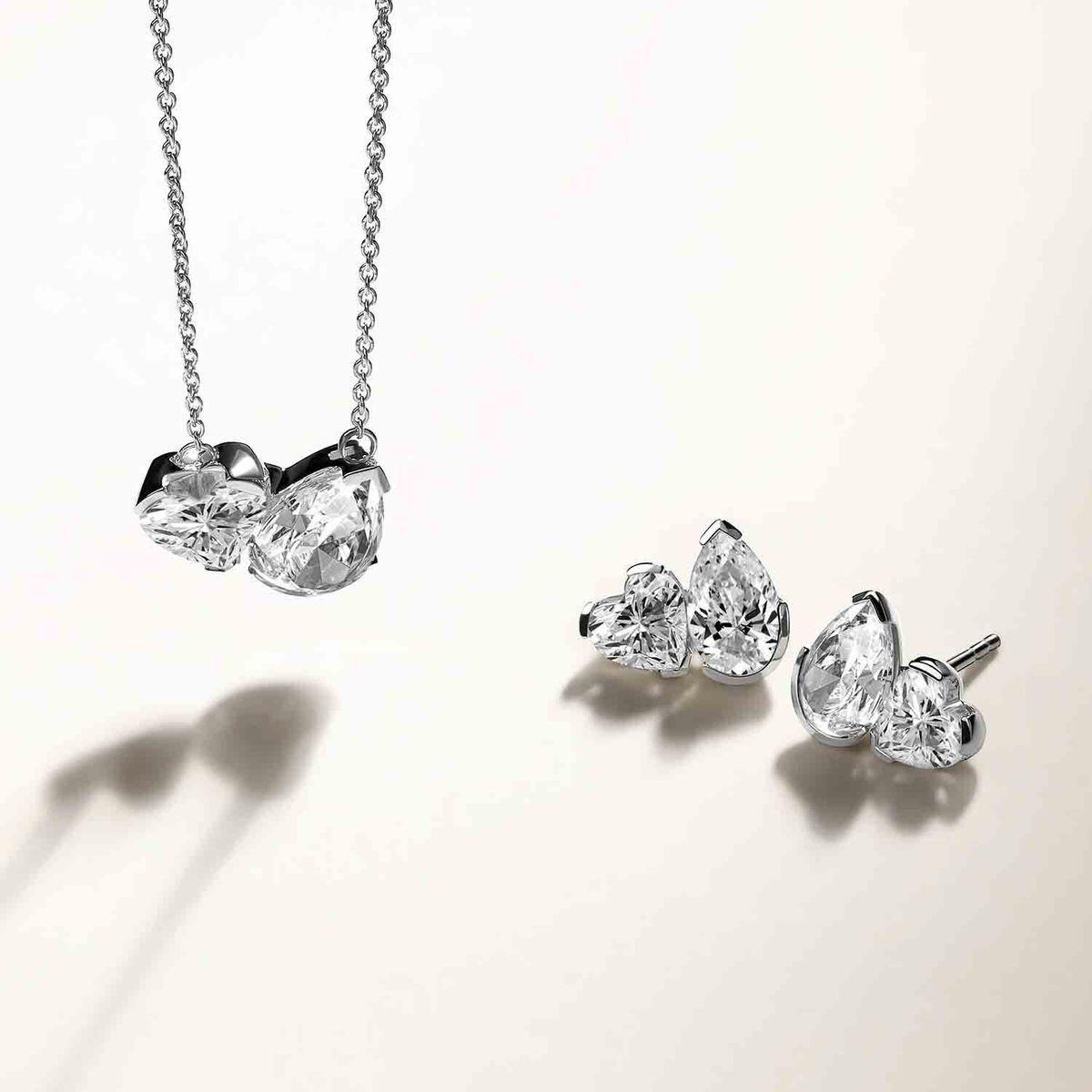 a pendant shown with matching earrings