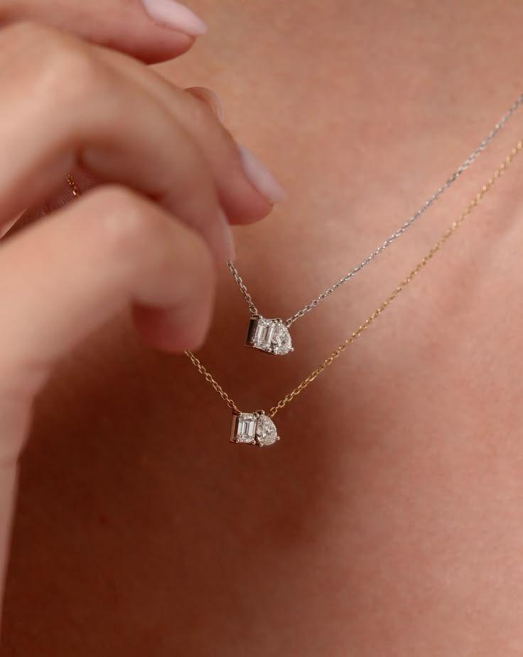 a fine chain with a small square drop