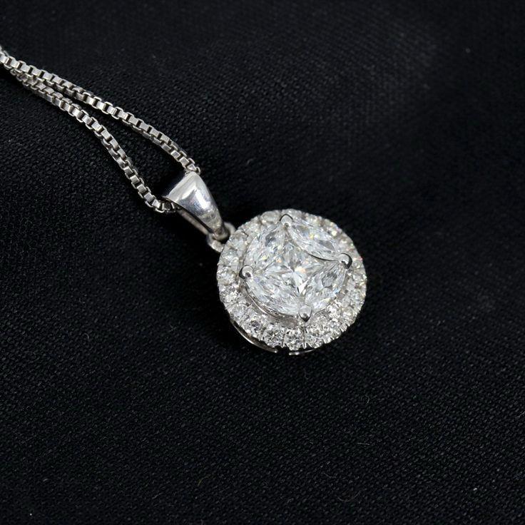 a round pendant with a bright clustered center