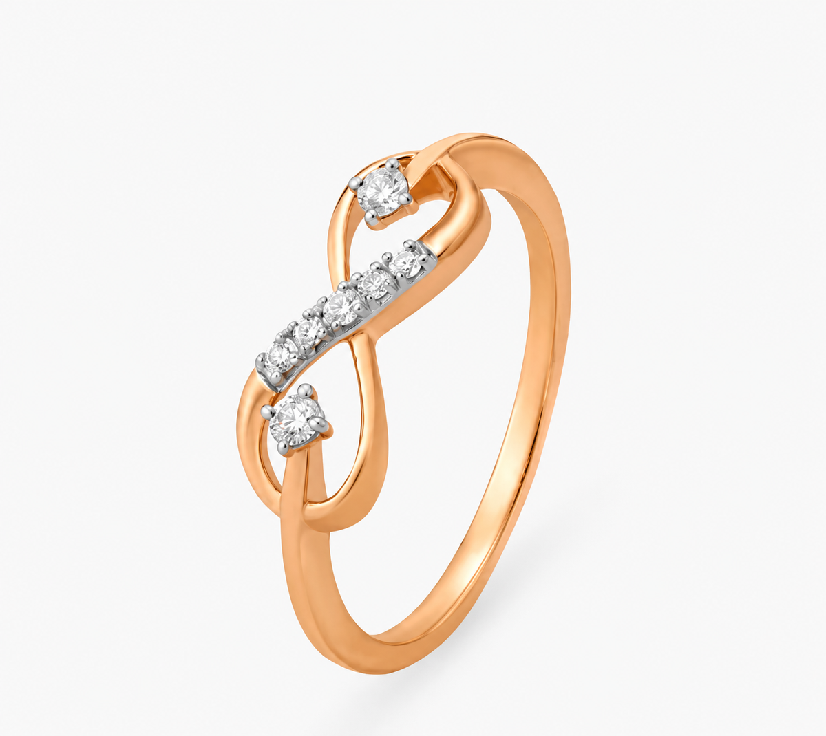 A sparkling ribbon sweeps between open rose-coloured loops with clear accents at either end.