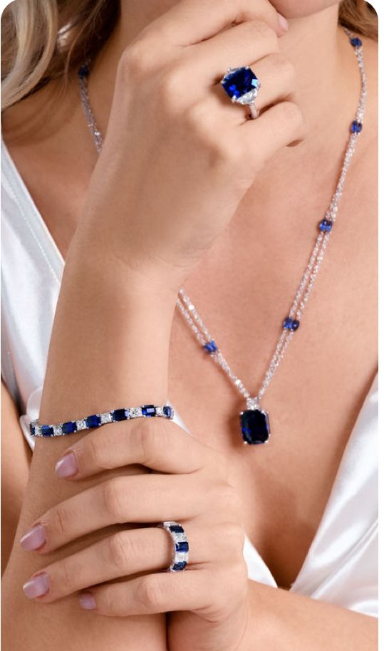 a blue-toned pendant suspended from a fine chain