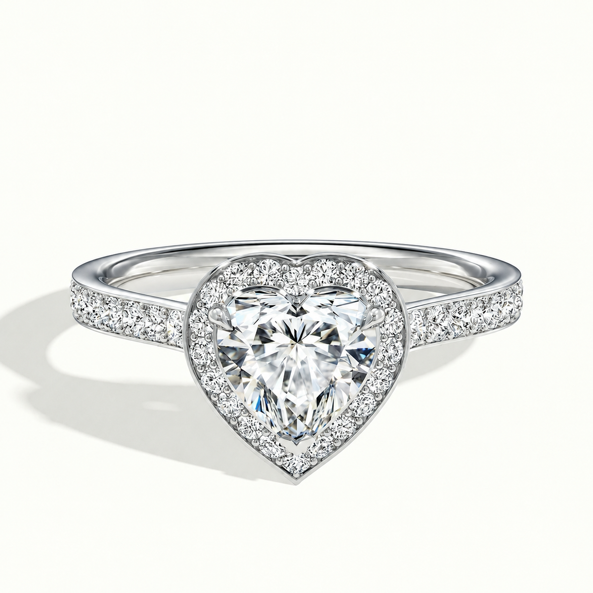 A heart-shaped clear centre is framed by a sparkling heart outline and stone-lined shoulders.