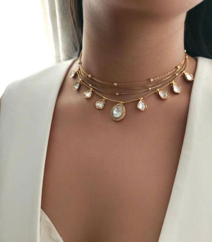 layered chains with a central hanging detail