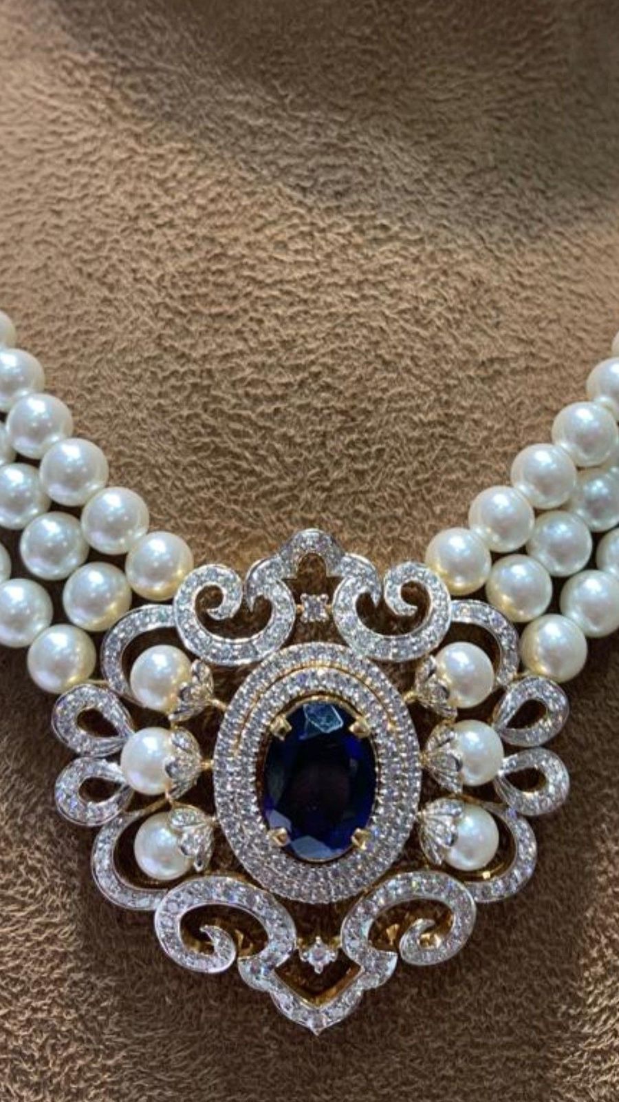a blue-toned center framed by pale decorative details