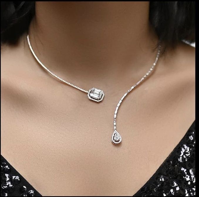 a centered square detail suspended from a fine chain
