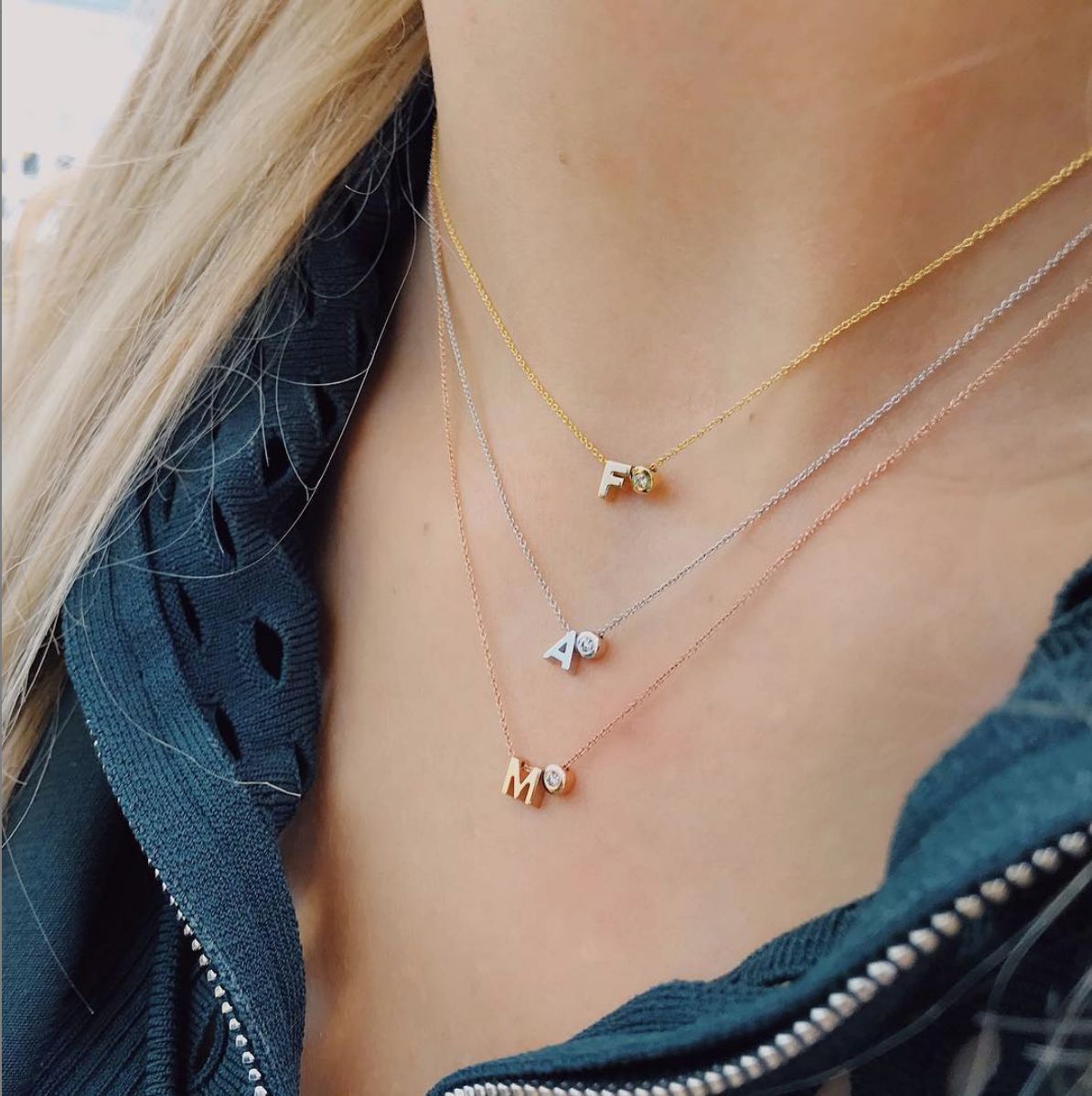 multiple delicate chains worn together