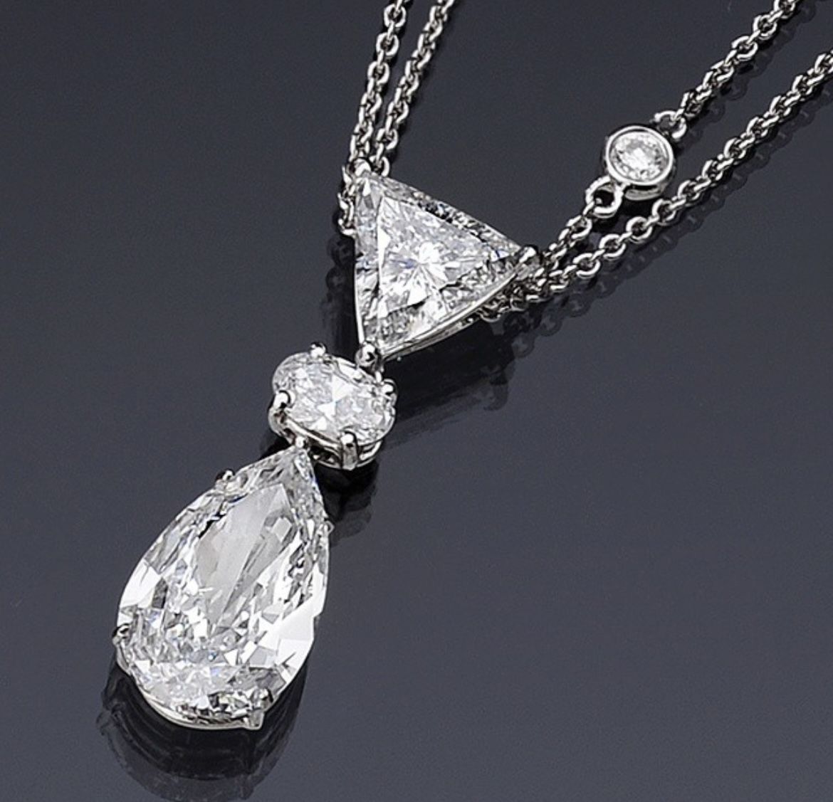 a pear-shaped hanging detail framed by bright accents
