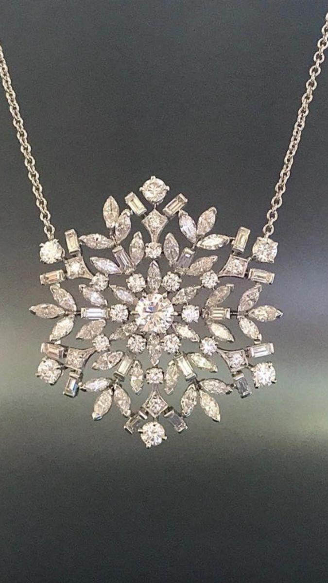 a flower-like pendant with repeated radiating details