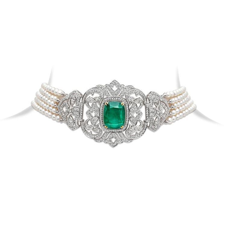 a curved close-fitting band with a green-toned center