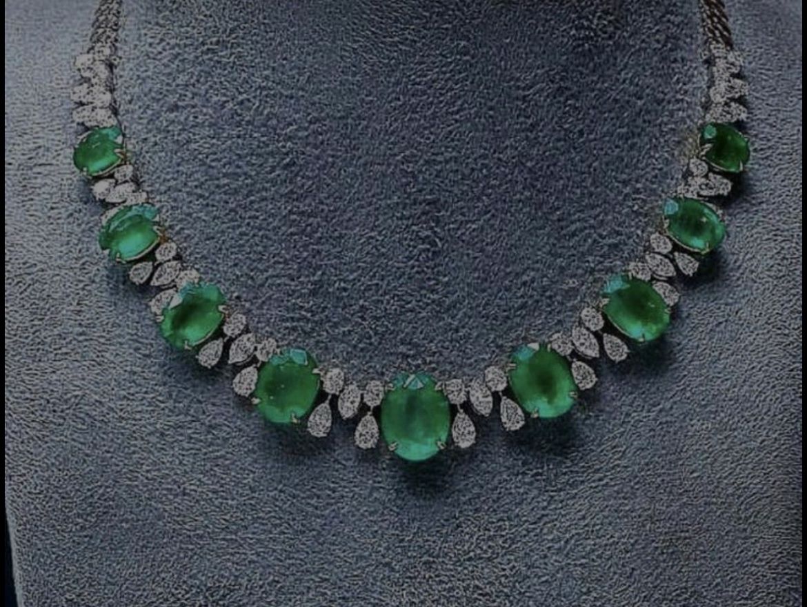 green-toned accents arranged around the neckline