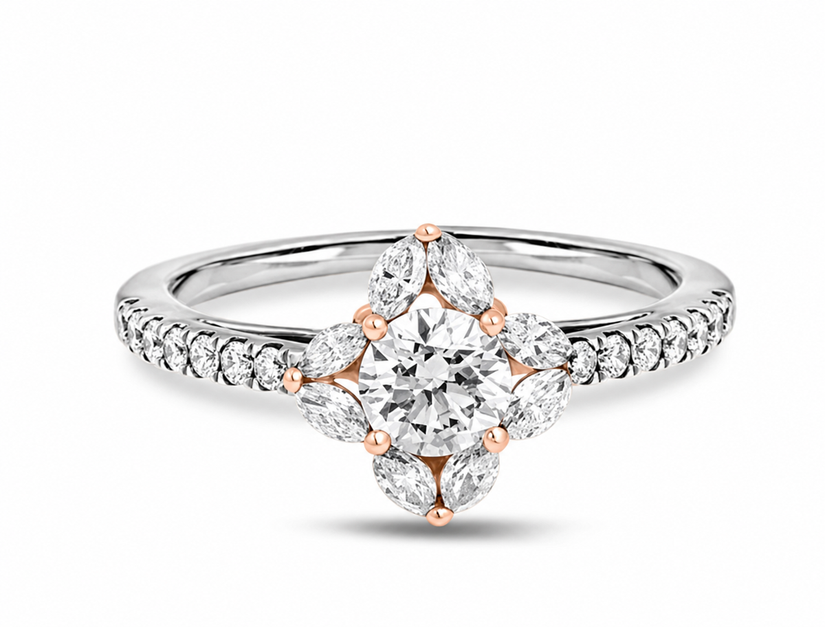 Four pointed petal-like pairs frame a round centre above a slim sparkling band.