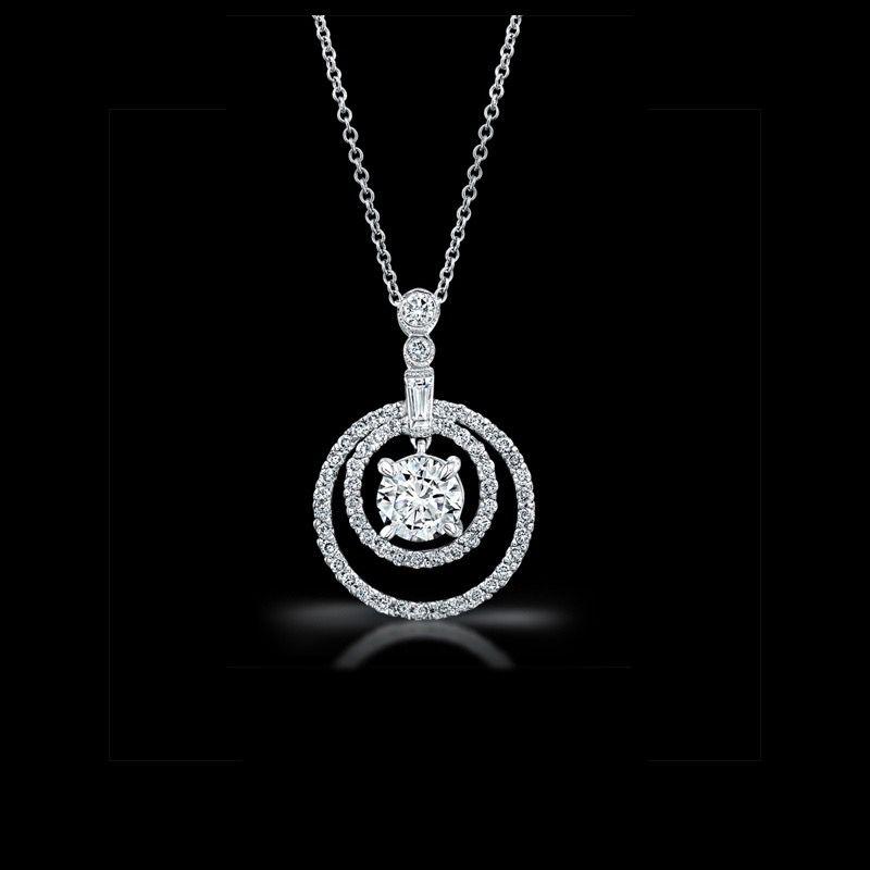 a fine chain ending in two hanging details