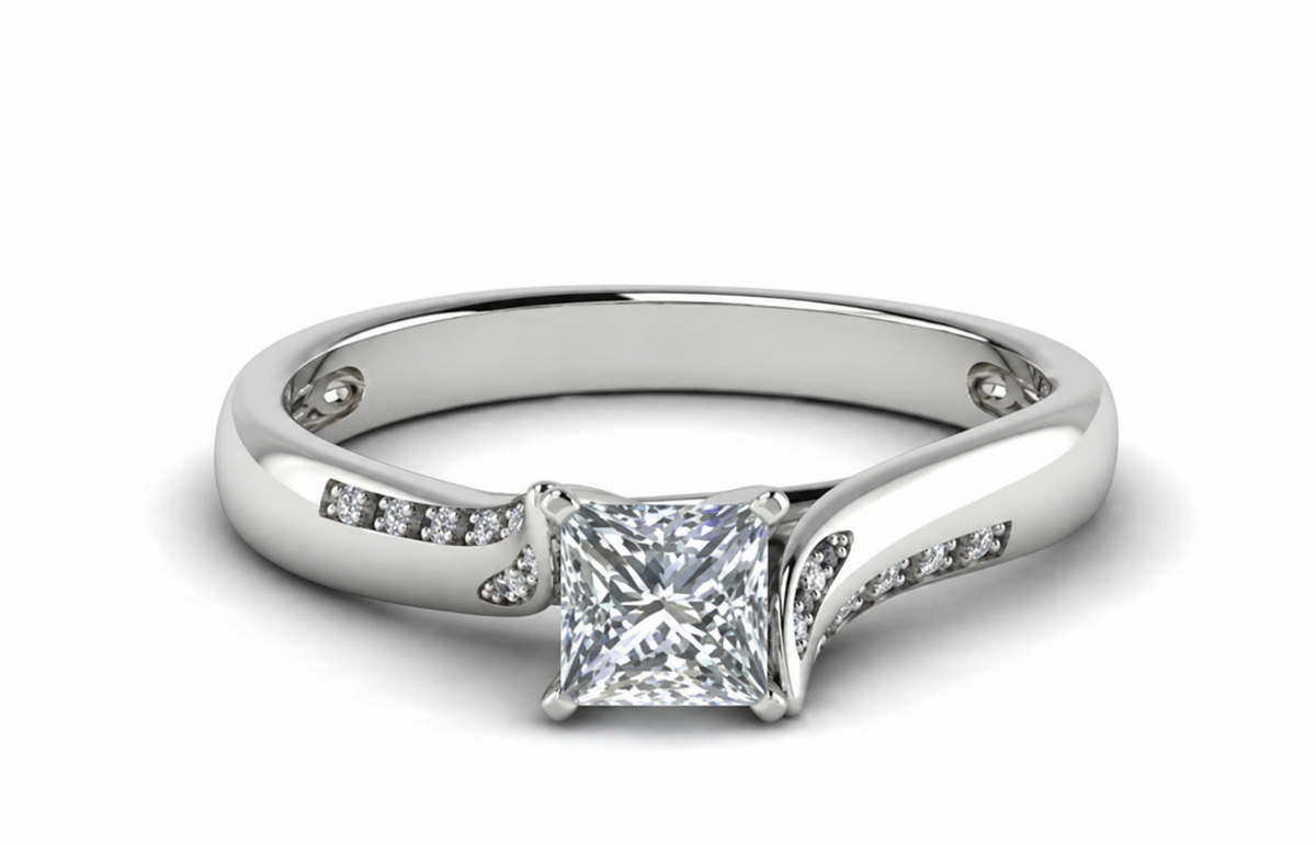 A square centre is held between softly curved shoulders with inset rows of clear accents.