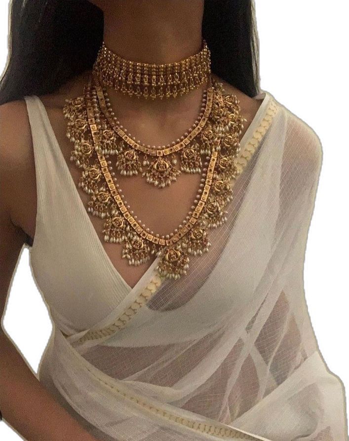 a necklace with matching earrings shown together