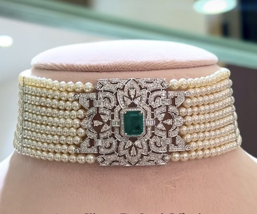 a broad close-fitting band with a rectangular center detail
