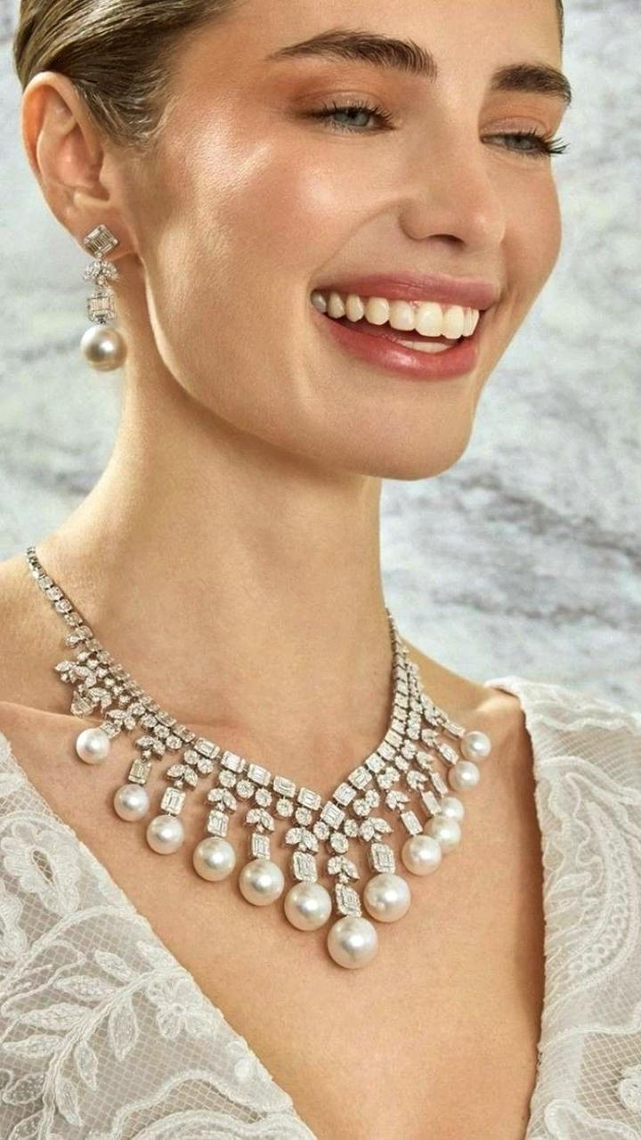 a necklace and earrings shown together