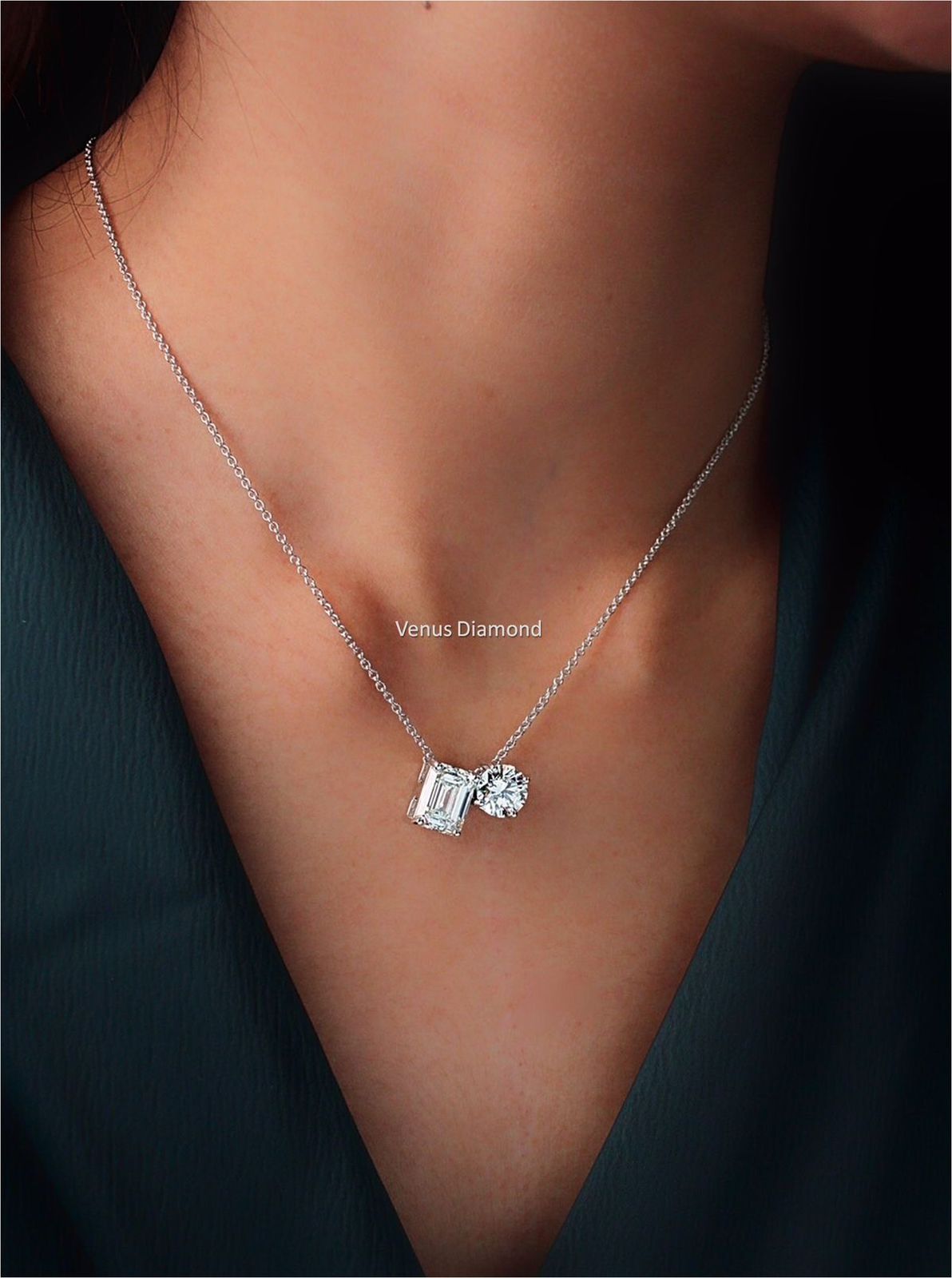 a vertical word-shaped pendant on a fine chain