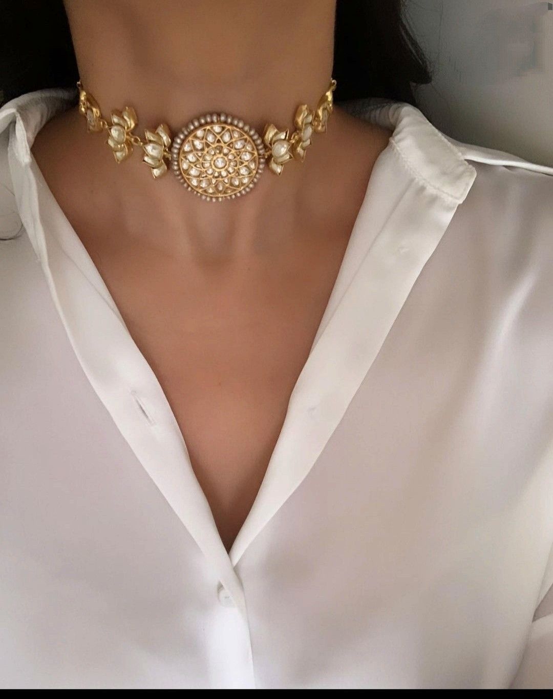 a necklace with an ornate central detail