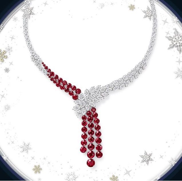 a fine necklace with a long red-toned hanging center