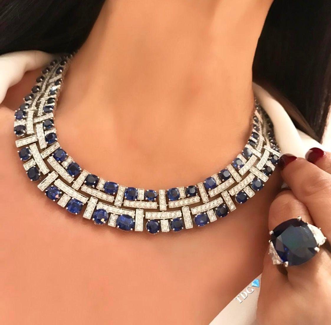 a close-fitting collar with blue and bright rectangular accents