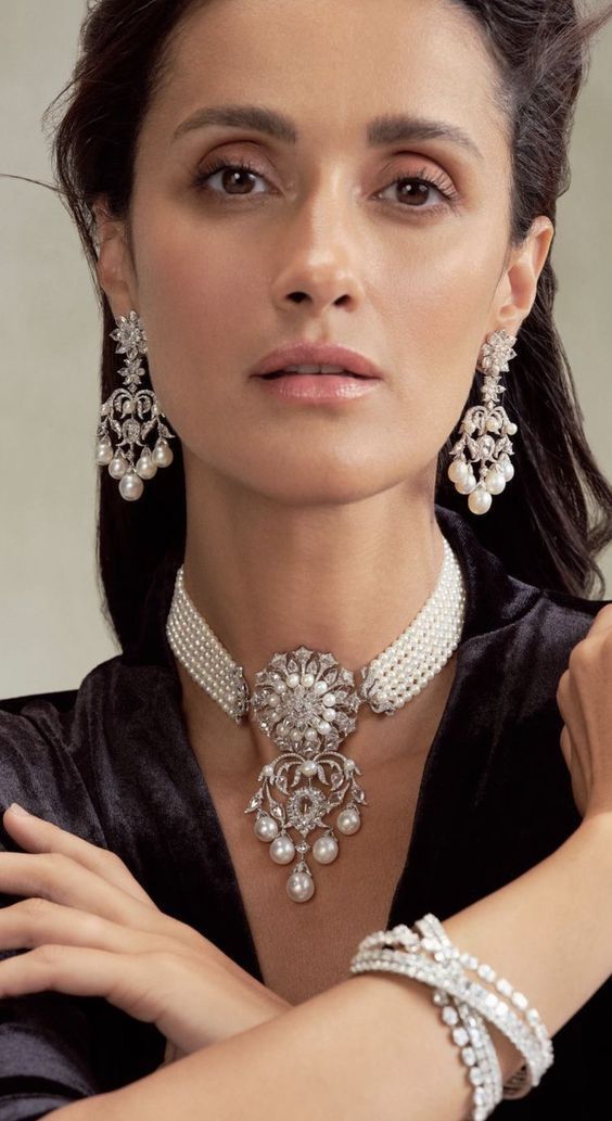 a layered necklace design shown with coordinating jewelry